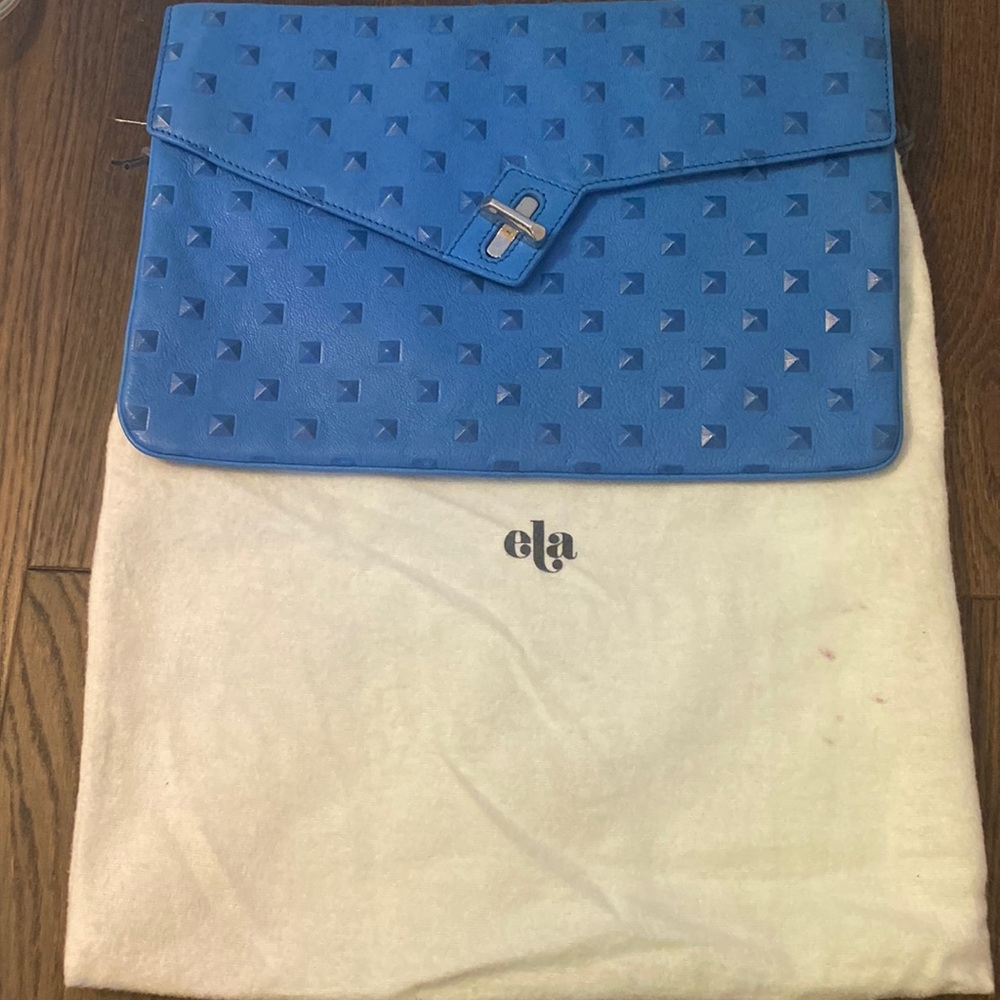 Ela clutch in electric blue. Brand new. Never been worn